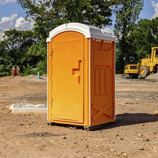 how often are the portable restrooms cleaned and serviced during a rental period in Arlington Iowa